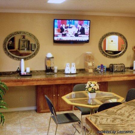 Hillcrest Inn & Suites אוזונה מסעדה תמונה